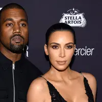 Kim Kardashian dan Kanye West (Dimitrios Kambouris / AFP)