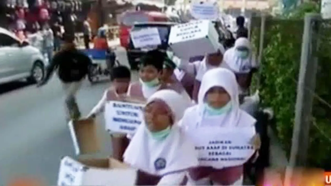 Siswa SD Berunjuk Rasa Melawan Asap