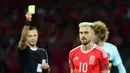 Wales akan kehilangan Aaron Ramsey akibat hukuman akumulasi kartu saat melawan Portugal pada semifinal Piala Eropa 2016. Sebuah kehilangan bagi The Dragons karena Ramsey sukses sebagai pengatur irama permainan Wales. (AFP/Emmanuel Dunand)