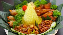 Ilustrasi tumpeng nasi kuning. Foto: opiracatering.com