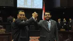 Ketua MK terpilih, Arief Hidayat (kiri) bersama Wakil Ketua MK terpilih, Anwar Usman (kanan) usai Rapat Pleno di Jakarta, Senin (12/1). (Liputan6.com/Herman zakharia)