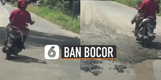 VIDEO: Pria Nekat Kendarai Motor Saat Ban Bocor