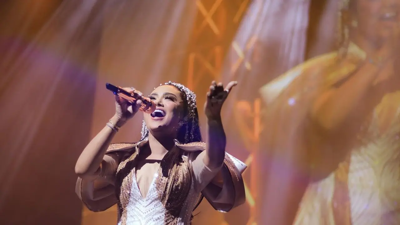 Kris Dayanti konser di Singapura (Instagram/krisdayantilemos)