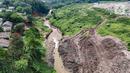 Foto udara memperlihatkan kondisi Tempat Pembuangan Akhir (TPA) sampah Cipayung, Depok, Jawa Barat, Selasa (7/5/2024). (merdeka.com/Arie Basuki)
