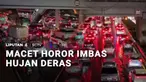 Akibat hujan deras yang turun di jam pulang kerja, kemacetan panjang pun terjadi di sejumlah wilayah Jakarta, termasuk ruas tol dalam kota.