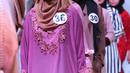 Ekspresi peserta saat memeragakan busana pada acara Hijab Hunt 2018 di Jakarta, Minggu (6/5). Kegiatan ini digagas oleh Baitul Muslimin Indonesia (Bamusi). (Liputan6.com/Angga Yuniar)
