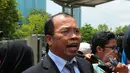 Pengacara keluarga Susilo Bambang Yudhoyono (SBY), Palmer Situmorang menjawab pertanyaan wartawan saat di Gedung KPK, Jakarta, Selasa (31/3/2015). (Liputan6.com/Herman Zakharia)