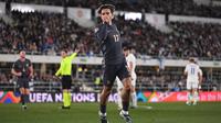 The Three Lions membuka keunggulan di menit ke-18 lewat tendangan akurat dari Jack Grealish. (Jonathan NACKSTRAND/AFP)
