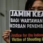 Ilustrasi demonstrasi mendukung jurnalis Indonesia, Veby Mega Indah, yang tertembak peluru karet saat meliput unjuk rasa di Hong Kong. (AFP/Mohd RASFAN)