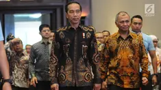 Presiden Joko Widodo (Jokowi) didampingi Ketua KPK Agus Rahardjo menghadiri Peringatan Hari Anti Korupsi Sedunia 2018 di Jakarta, Selasa (4/12). Acara ini mengambil tema Menuju Indonesia Bebas Dari Korupsi. (Liputan6.com/Angga Yuniar)
