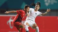 Duel Indonesia vs Korsel di penyisihan Grup A sepak bola putri Asian Games 2018 di Stadion Gelora Sriwijaya Jakabaring, Palembang, Selasa (21/8/2018). (Bola.com/Dok. INASGOC)