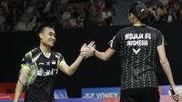 Pebulutangkis Indonesia, Hafiz Faizal / Gloria Widjaja, merayakan kemenangan atas pasangan Malaysia pada Indonesia Masters 2019 di Istora Senayan, Jakarta, Selasa (22/1). Hafiz / Gloria lolos ke babak kedua. (Bola.com/M. Iqbal Ichsan)