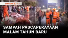 Pasca-perayaan malam pergantian tahun di kawasan Bundaran HI, Jakarta Pusat, Petugas PPSU dan Dinas Lingkungan Hidup Jakarta, sibuk melakukan bersih-bersih sampah, pada Kamis dini hari. Petugas melakukan bersih-bersih dengan menggunakan sapu hingga m...