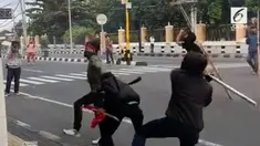 Setelah memeriksa 69 saksi terkait pembakaran pos polisi, kini tiga orang telah ditetapkan menjadi tersangka.