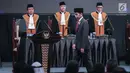 Presiden Joko Widodo (Jokowi) bersiap menyampaikan sambutannya saat menghadiri Pleno Mahkamah Agung (MA) RI tahun 2019 dalam rangka laporan tahunan MA tahun 2018 2018 di Jakarta, Rabu (27/2). (Liputan6.com/Faizal Fanani)