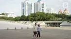 Warga beraktivitas di sekitar Taman Lapangan Banteng, Jakarta, Kamis (20/2/2020). Adanya revitalisasi kawasan Monas menyebabkan sebagian warga lebih memilih Lapangan Banteng sebagai tempat menghabiskan waktu untuk berolahraga serta berekreasi. (Liputan6.com/Immanuel Antonius)