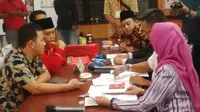 PDIP kota Malang menyerahkan DCS untuk Pileg 2019 di KPU Kota Malang pada Juli 2018 (Liputan6.com/Zainul Arifin)