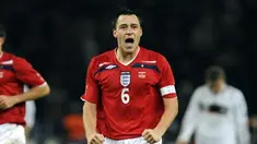 England's Captain John Terry celebrates after scoring the 1-2 during their Germany vs England friendly match at Olympic stadium in Berlin on November 19, 2008. England won 1-2. AFP PHOTO/OLIVER LANG
