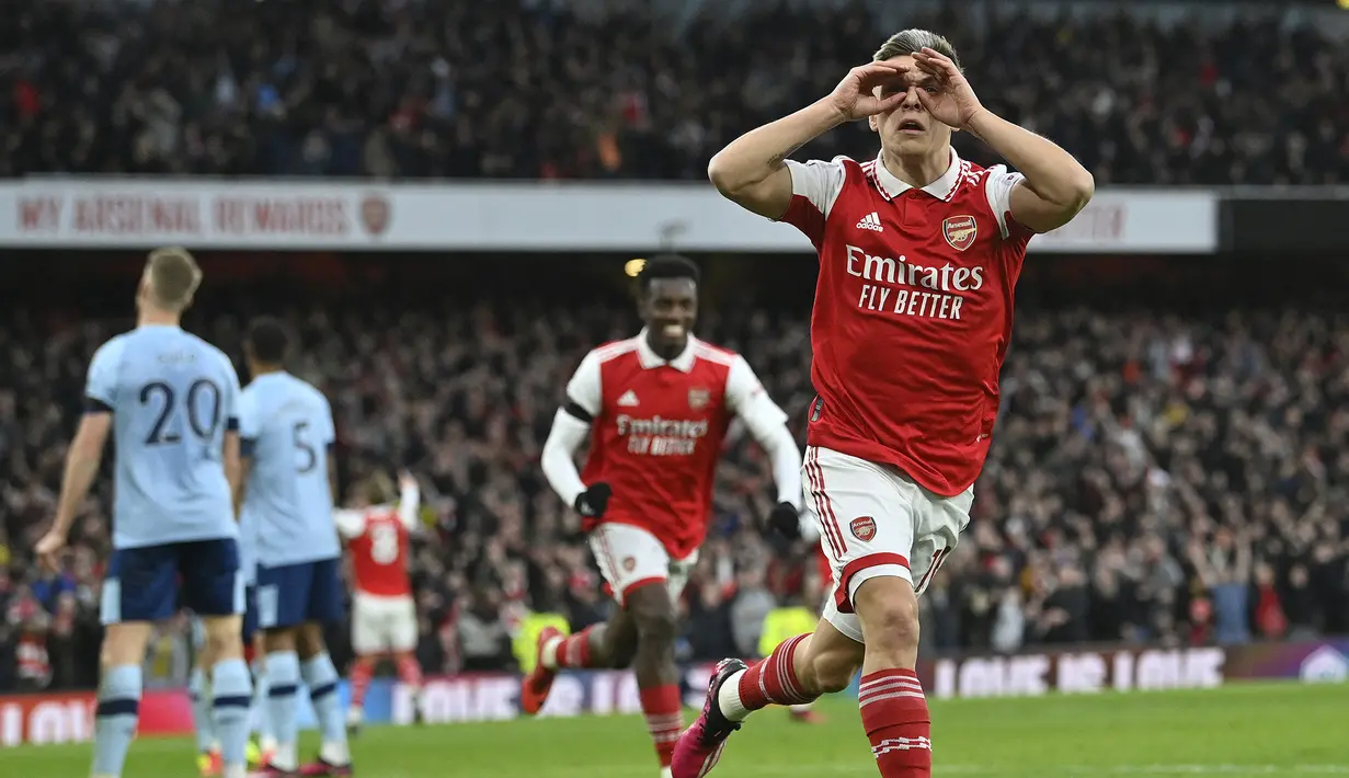 Selebrasi gelandang Arsenal, Leandro Trossard setelah mencetak gol ke gawang Brentford dalam laga pekan ke-23 Liga Inggris 2022/2023 di Emirates Stadium, London (11/2/2023). Pemain yang dibeli Arsenal dari Brighton and Hove Albion ini telah menyumbang satu gol bagi The Gunners dari total 4 laga di semua ajang. (AFP/Justin Tallis)