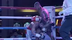 Petinju Indonesia, Jansen Marapu (kanan) menjatuhkan petinju Thailand, Phuttiphong Rakoon pada kelas Lightweight Mahkota Boxing Super Series di Cilandak Town Square, Jakarta (10/3/2018). Jansen menang TKO pada ronde ke sembilan. (Bola.com/Nick Hanoatubun)