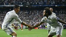 Cristiano Ronaldo (kiri) saat masih bermain di Real Madrid bersama Marcelo. (foto: JAVIER SORIANO / AFP)