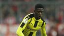 Pada 12 Mei 2016, Dembele menandatangani kontrak lima tahun dengan Borussia Dortmund dan Pada 14 agustus 2016, Dembele melakukan debutnya saat kalah 0-2 melawan Bayern Munchen. (AP/Matthias Schrader,file)