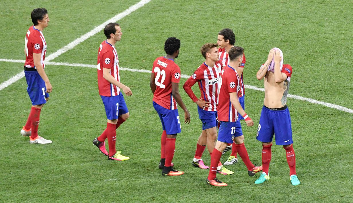 Atletico Madrid - Klub asal kota Madrid Spanyol ini telah tiga kali melaju ke partai final Liga Champions. Namun sayang Los Rojiblancos selalu gagal di partai puncak tersebut. (AFP/Tiziana Fabi)