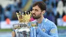 Bernardo Silva. Gelandang serang Portugal berusia 28 tahun yang kini menjalani musim ke-6 bersama Manchester City ini total telah meraih 4 gelar Liga Inggris bersama The Citizens sebagai satu-satunya klub yang pernah dan masih dibelanya di Liga Inggris. Empat gelar tersebut diraihnya pada musim 2017/2018, 2018/2019, 2020/2021 dan 2021/2022. Hingga kini ia telah tampil dalam 170 laga di Liga Inggris dengan torehan 31 gol dan 31 assist. (AFP/Pool/Peter Powell)