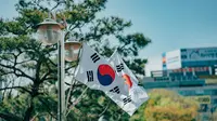 Ilustrasi bendera negara Korea Selatan. (Photo by Daniel Bernard on Unsplash)