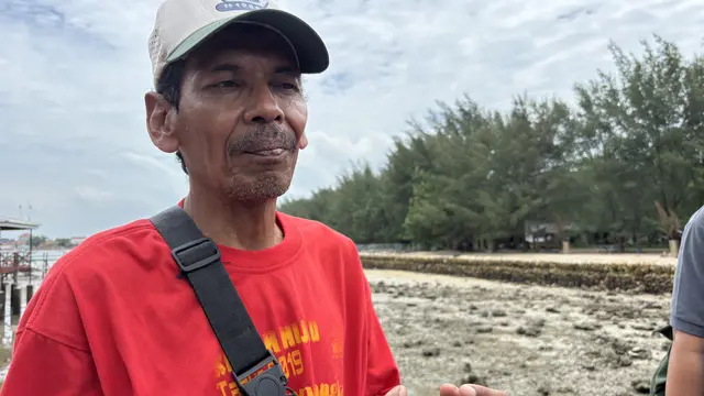 Mohamad Sahril, Ketua Kelompok Sadar Wisata Payung Kuning (Liputan6.com/Ady Anugrahadi)