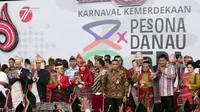 Dua hari pelaksanaan Karnaval Kemerdekaan Pesona Danau Toba 2016 di Balige dan Parapat, cukup membuat Presiden Joko Widodo terpesona. (foto: twitter @Kemenpar_RI )