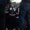 Mahasiswa Universitas Trisakti melakukan aksi unjuk rasa di sekitar Kawasan Patung Arjuna Wijaya atau Patung Kuda, Jakarta, Kamis (12/5/2022). Mereka menuntut penyelesaian kasus pelanggaran HAM yang terjadi saat aksi reformasi 1998. (Liputan6.com/Helmi Fithriansyah)