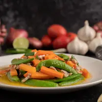 Ilustrasi tumis kapri wortel yang lezat dan sehat/copyright freepik.com/ photo by jcomp