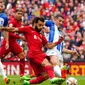 Pemain Liverpool Mohamed Salah mencoba melakukan tendangan ke gawang Brighton and Hove Albion pada pertandingan sepak bola Liga Premier Inggris di Anfield, Liverpool, Inggris, 1 Oktober 2022. Pertandingan berakhir imbang 3-3. (Peter Byrne/PA via AP)