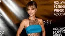 Halle Berry menjadi wanita kulit hitam pertama yang meraih Oscar untuk pemeran utama wanita terbaik. Di usia 49 tahun, aktris cantik itu masih memiliki perut rata dan dada yang padat. (Frazer HARRISON/GETTY IMAGES NORTH AMERICA/AFP)