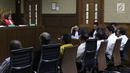 Tujuh mantan anggota DPRD Sumut menjalani sidang dakwaan di Pengadilan Tipikor, Jakarta, Kamis (27/12). Mereka didakwa menerima suap dari Gatot Pujo Nugroho saat masih menjabat sebagai Gubernur Sumut. (Liputan6.com/Helmi Fithriansyah)