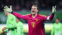 Kiper Timnas Jerman berusia 37 tahun yang kini tengah menjalani musim ke-13 bersama Bayern Munchen, Manuel Neuer saat ini menjadi kiper dengan gaji tertinggi di dunia. Bayern Munchen memberinya bayaran sebesar 353,5 ribu pounds atau setara Rp6,9 miliar per pekan. Eks Schalke tersebut masih terikat kontrak bersama Bayern Munchen hingga akhir musim 2024/2025. (AFP/Ronny Hartmann)