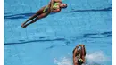  Para perenang indah asal Ukraina beraksi pada Olympic Games Kualifikasi Olympic Games Turnamen di Rio de Janeiro, Brasil, Sabtu (5/3/2016). (REUTERS/Sergio Moraes)