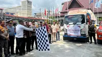 Pelepasan mobil pengangkut logistik Pemilu 2024 di Kabupaten Rokan Hulu. (Liputan6.com/M Syukur)
