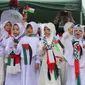 Aksi anak-anak di Kabupaten Bone Bolango saat aksi Membasuh Luka Palestina (Arfandi Ibrahim/Liputan6.com)