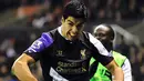 Penyerang Liverpool Luis Suarez merayakan setelah mencetak gol saat pertandingan sepak bola Liga Utama Inggris antara Stoke City melawan Liverpool di The Britannia stadion, pada (12/01/14) waktu setempat.(Foto: AFP/Andrew Yates)