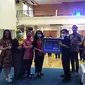 Peringatan 3 tahun bom gereja Surabaya dengan buka puasa bersama. (Dian Kurniawan/Liputan6.com)