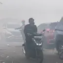 Napas Tersengal di Bawah Kepungan Asap TPA Jatiwaringin