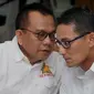 Ketua DPD DKI Gerindra M Taufik berbincang dengan Anggota Dewan Pembina Partai Gerindra Sandiaga Uno saat proses penjaringan Calon Gubernur (Cagub) DKI Jakarta oleh Partai Gerindra di Hotel Sari Pan Pasific, (27/1). (Gempur M Surya/Liputan6.com)