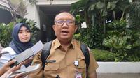 Kepala Dinas Lingkungan Hidup (DLH) DKI Jakarta Asep Kuswanto ditemui di Balai Kota DKI Jakarta, Senin (13/2/2023). (Dok. Liputan6.com/Winda Nelfrira)