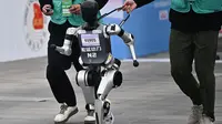 Ajang ini sekaligus menunjukkan tekad China untuk memimpin perlombaan global dalam teknologi mutakhir robot humanoid. (Pedro PARDO/AFP)