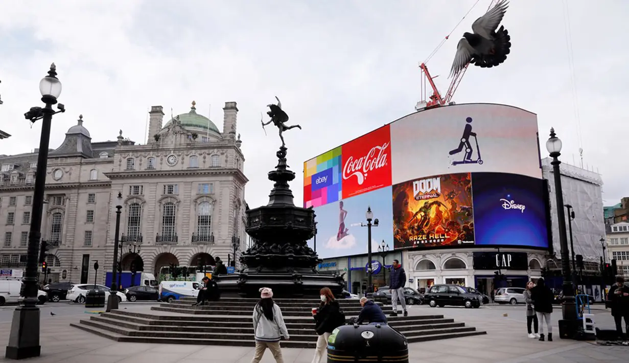 Pemandangan Piccadilly Circus di London, Inggris (18/3/2020). PM Inggris Boris Johnson pada Rabu (18/3) mengatakan seluruh sekolah akan ditutup mulai Jumat (20/3) setelah otoritas kesehatan mengonfirmasi total 2.626 kasus infeksi COVID-19 dan 104 kematian akibat penyakit tersebut. (Xinhua/Tim Irelan
