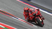 Pembalap Ducati Lenovo Team, Francesco Bagnaia menjadi juara pada balapan MotoGP Austria 2022 yang berlangsung di Sirkuit Red Bull Ring, Spielberg, Minggu (21/8/2022) malam WIB. (AFP/Vladimir Simicek)