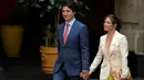 Ia menikah dengan Sophie saat kembali ke Montreal pada 2002. (NICOLAS ASFOURI / AFP)