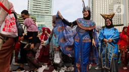 Mereka berpawai untuk merayakan masa lalu dan menyuarakan masa depan. (Liputan6.com/Herman Zakharia)